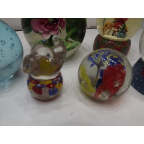 2094 - Box of glass paperweights & snow globes