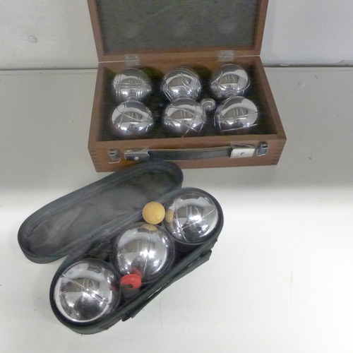 2142 - Boules/petanque sets, 1 with case & 1 with holdall