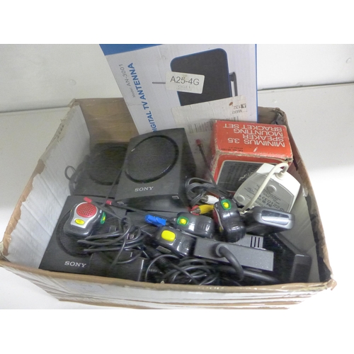 2167 - Box of assorted speakers & electrical items: remotes, digital antenna, walkie talkie, etc.