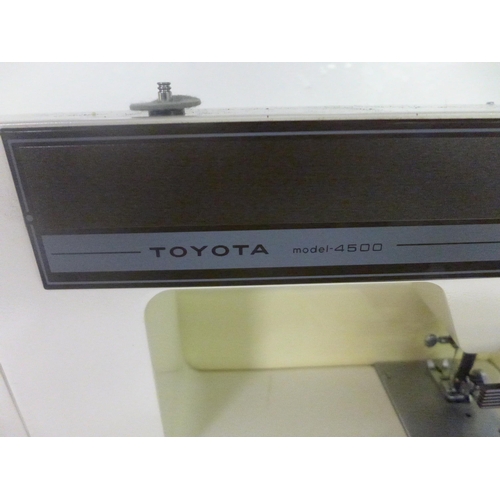 2168 - Toyota computerised sewing machine in case with pedal - W