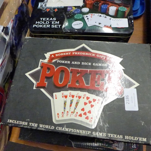 2186 - Three poker sets, one with poker mat