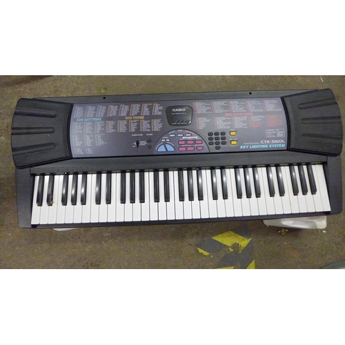 2210 - Casio lighting keyboard in box - no power supply (model CTK 560L)