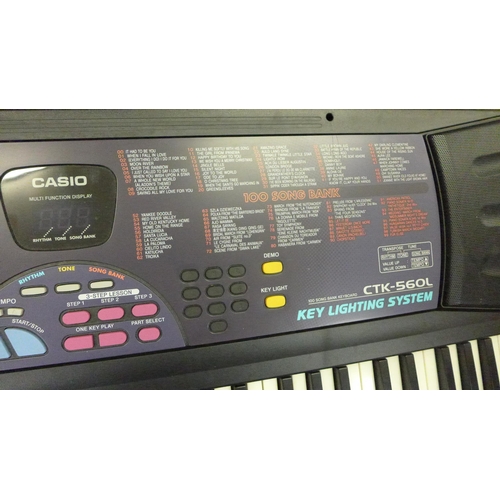 2210 - Casio lighting keyboard in box - no power supply (model CTK 560L)