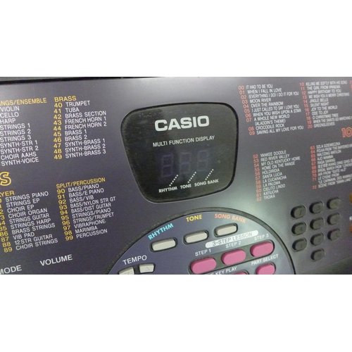 2210 - Casio lighting keyboard in box - no power supply (model CTK 560L)