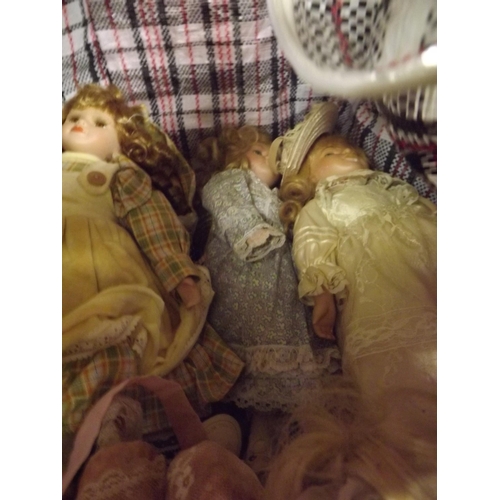 2268 - 25 Porcelain dolls in various dresses