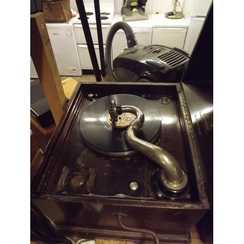 2299 - Vintage HMV gramophone with qty of 45 singles