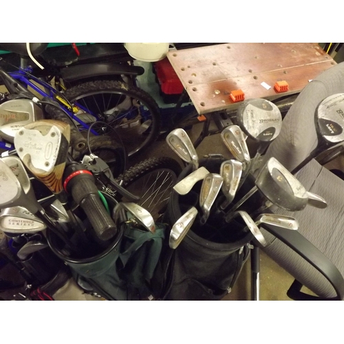 2330 - 4 Golf bags with qty. of golf clubs