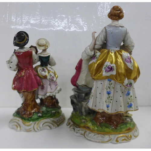 614 - Two German porcelain figure groups; musicians and a courting couple with fruit, some a/f