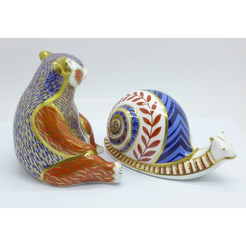 636 - A Royal Crown Derby Honey Bear paperweight with silver stopper and a Royal Crown Derby Snail paperwe... 