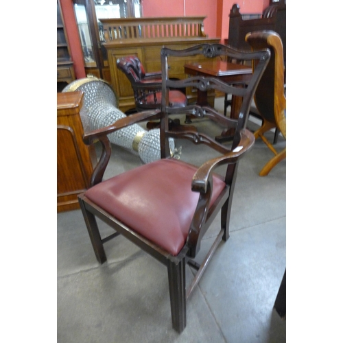 25 - A set of ten Chippendale Revival mahogany dining chairs