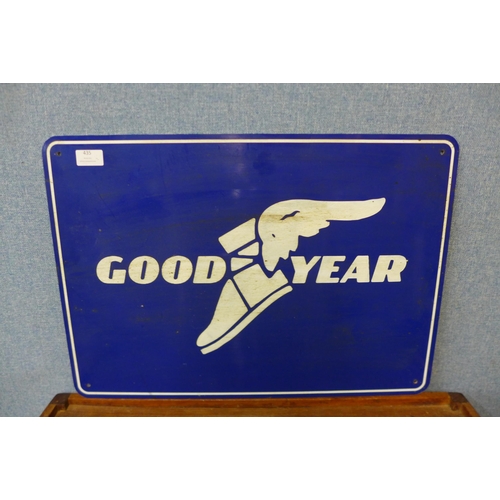 435 - An aluminium painted Good Year sign