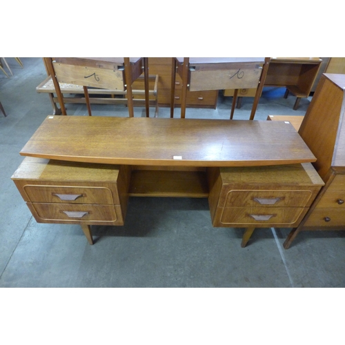 66 - A teak top desk