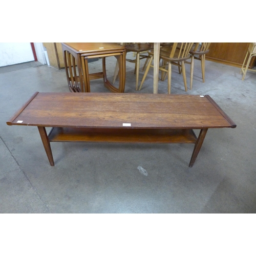 72 - A teak coffee table