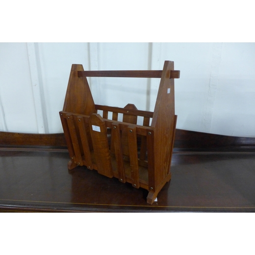 73 - A teak magazine rack