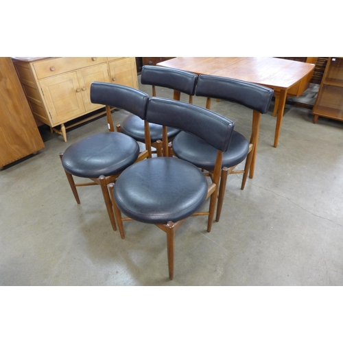 78 - A set of four G-Plan Fresco teak and black vinyl chairs