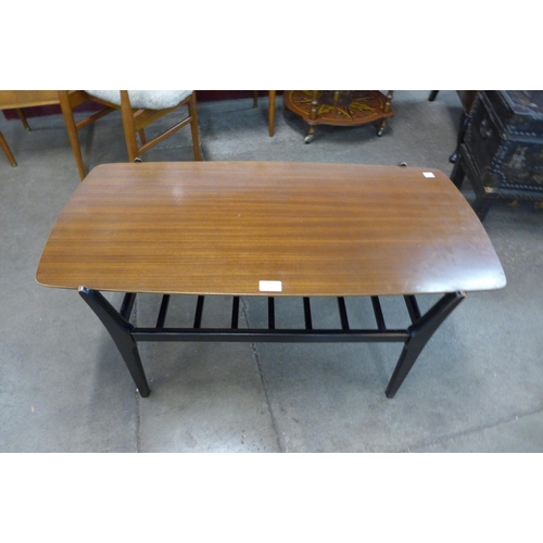 84 - A Nathan teak and ebonised coffee table