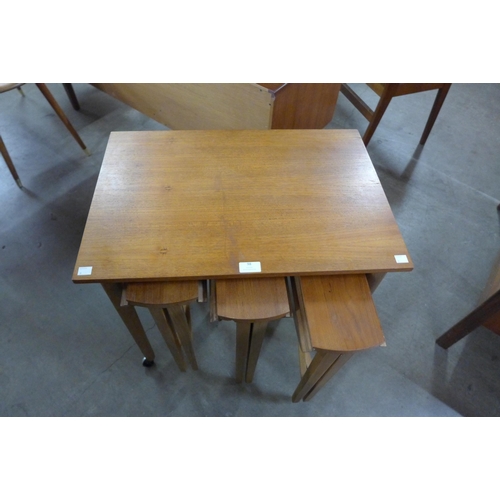 98 - A teak nest of tables