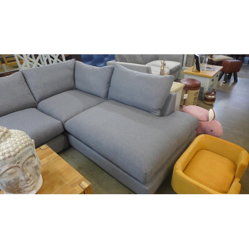 1301 - A grey upholstered corner sofa/chaise