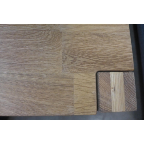 1302 - A rectangular oak coffee table with hidden drawer