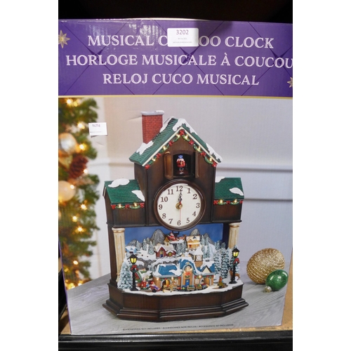 3202 - Musical Cuckoo Clock        (238-199 )* this lot is subject to vat