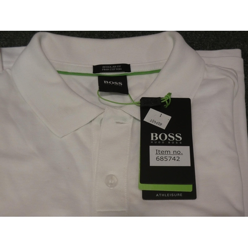 3143 - Hugo Boss white small polo shirt and a Calvin Klein grey small polo shirt * This lot is subject to V... 