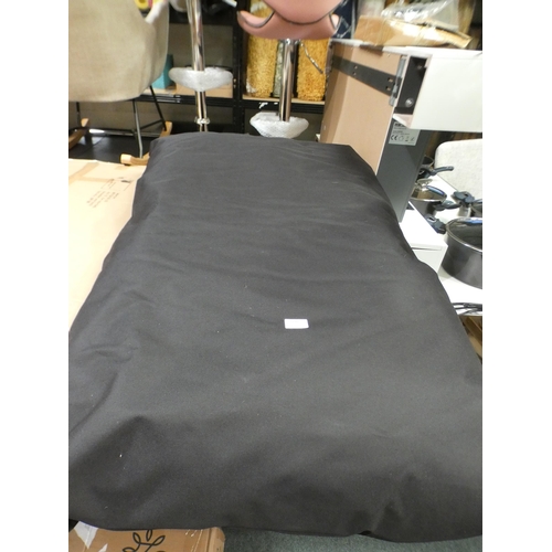 3140 - A black all weather pillow, 75 x 120cm * this lot is subject to VAT
