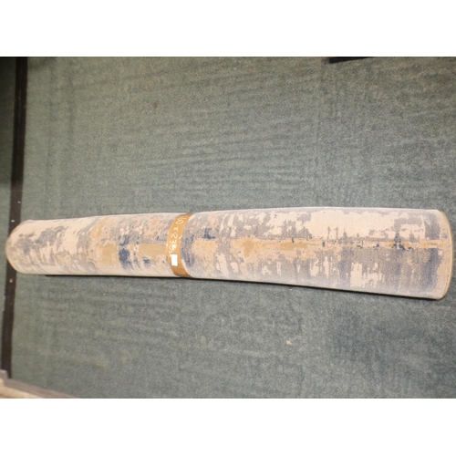 3154 - A blue and beige patterned rug - 160 x 230cm * this lot is subject to VAT