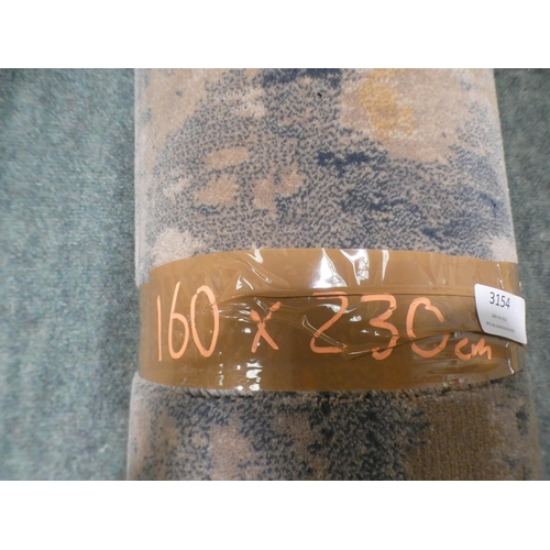 3154 - A blue and beige patterned rug - 160 x 230cm * this lot is subject to VAT