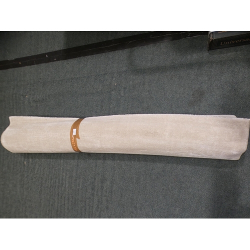 3161 - A large cream rug - 150 x 230cm * this lot is subject to VAT