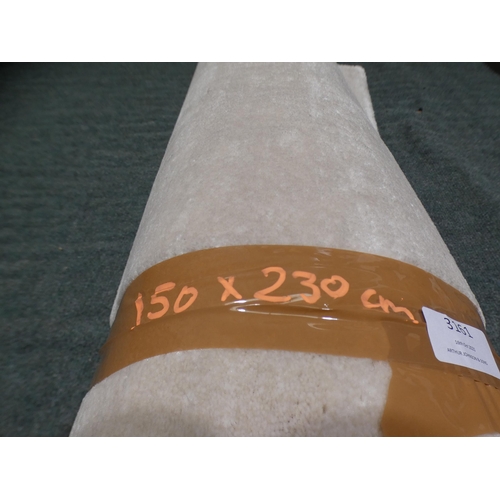 3161 - A large cream rug - 150 x 230cm * this lot is subject to VAT