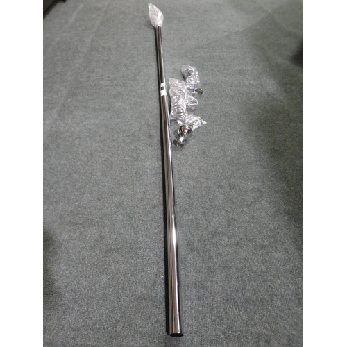 3136 - A chrome curtain pole and curtain hoops, 157cm long * this lot is subject to VAT