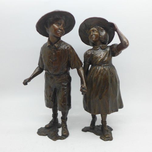 636 - A bronze figure of a young boy and girl signed Seva, numbered 80/195, 20cm