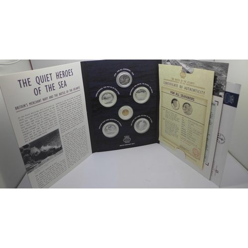 901 - A collection of commemorative coins including one silver 1973 Royal wedding coins, (folders not comp... 