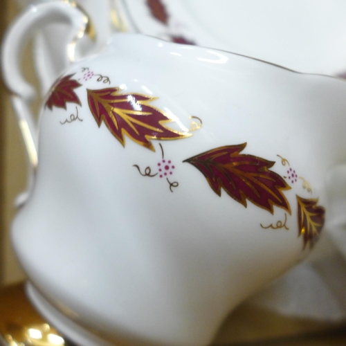 1141 - A Paragon Elegance tea service comprising six cups, saucers, side plates and one bread and butter pl... 