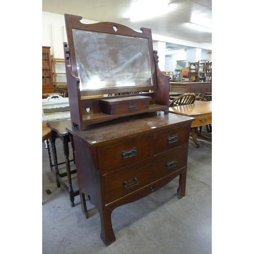 200 - An Arts and Crafts oak dressing table, attributed to Liberty & Co., London