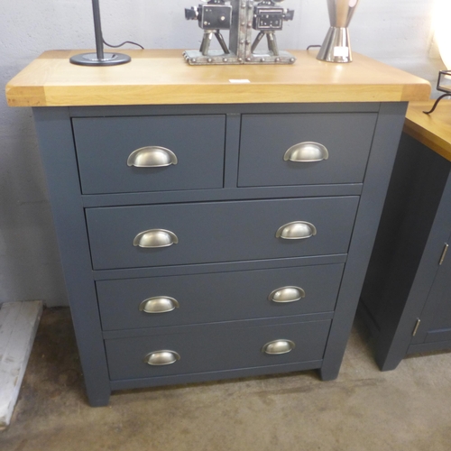 1323 - An oak and blue chest of drawers, marked ( HP203 B ) * This lot is subject to vat