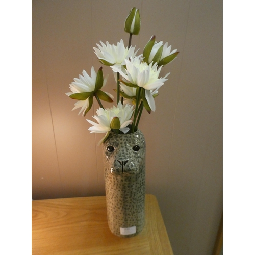 1334 - A seal flower vase with white floral arrangement  (16L25)   #