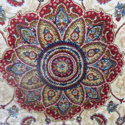 1399 - A gold ground full pile Kashmir style rug, unique medallion design, 170cm x 120cm