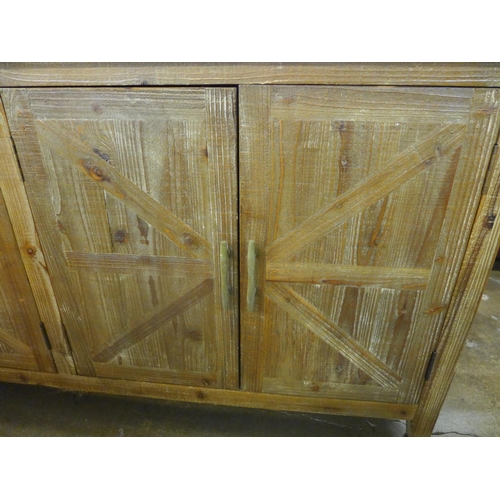 1509 - A rustic timber and stone four door sideboard