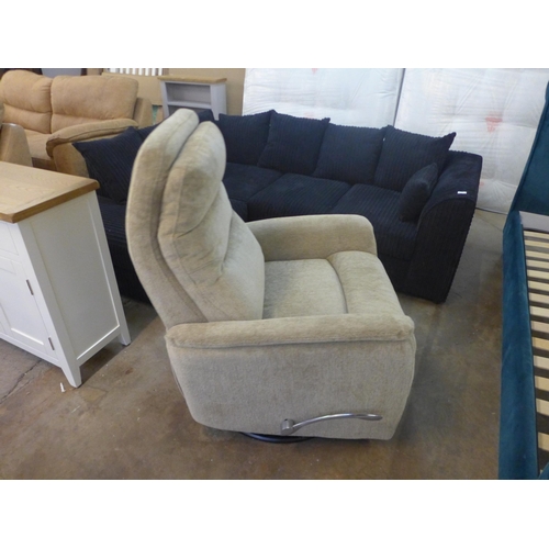 1526 - A beige fabric upholstered manual reclining armchair  *This lot is subject to VAT