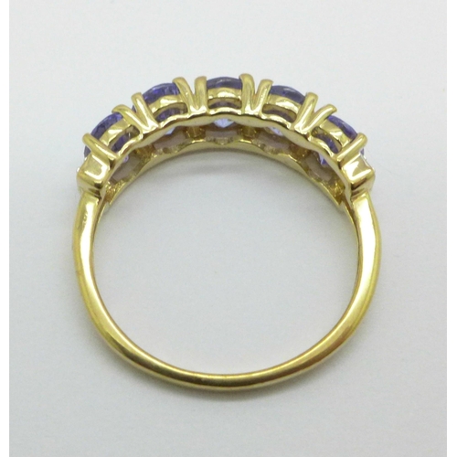 1002 - A 9ct gold, tanzanite and diamond ring, 2.0g, L