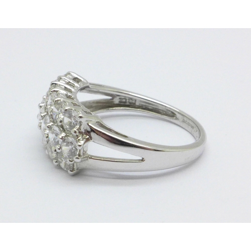 1004 - A 14ct white gold ring set with three rows of cubic zirconia, 4.4g, R