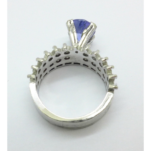 1012 - A 18ct white gold, tanzanite and 38 diamond cocktail ring, 5.2g, I