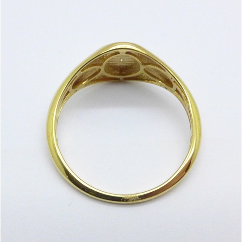 1014 - A silver gilt and diamond set signet ring, 2.5g, W