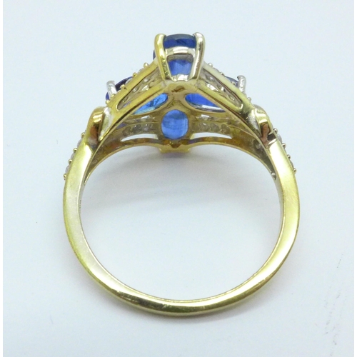 1017 - A silver gilt, kyanite and white topaz ring and certificate, 3.7g, S