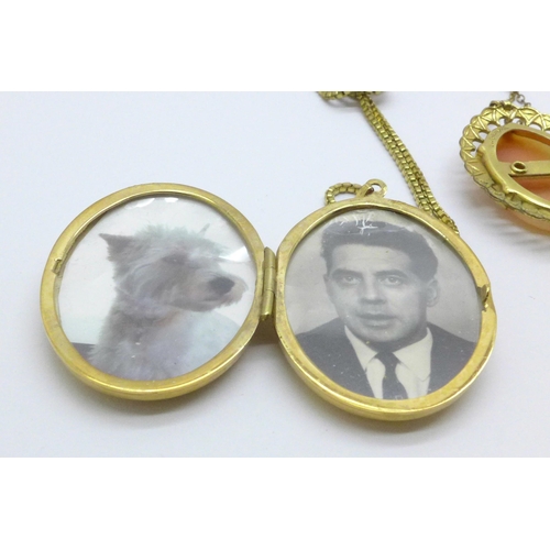 1023 - A large rolled gold locket and chain and a rolled gold cameo pendant and chain