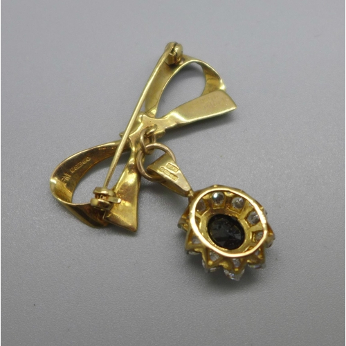 1049 - A 9ct gold bow brooch, with 9ct gold cluster pendant, 5.4g