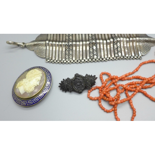 1067 - Jewellery including a coral necklace, enamelled cameo brooch etc.