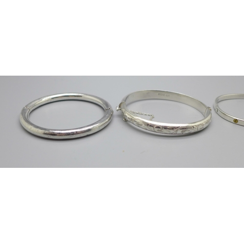 1080 - Three silver bangles, 54g