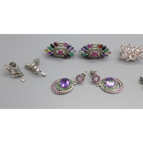 1090 - An assortment of silver and white metal jewellery set with coloured stones